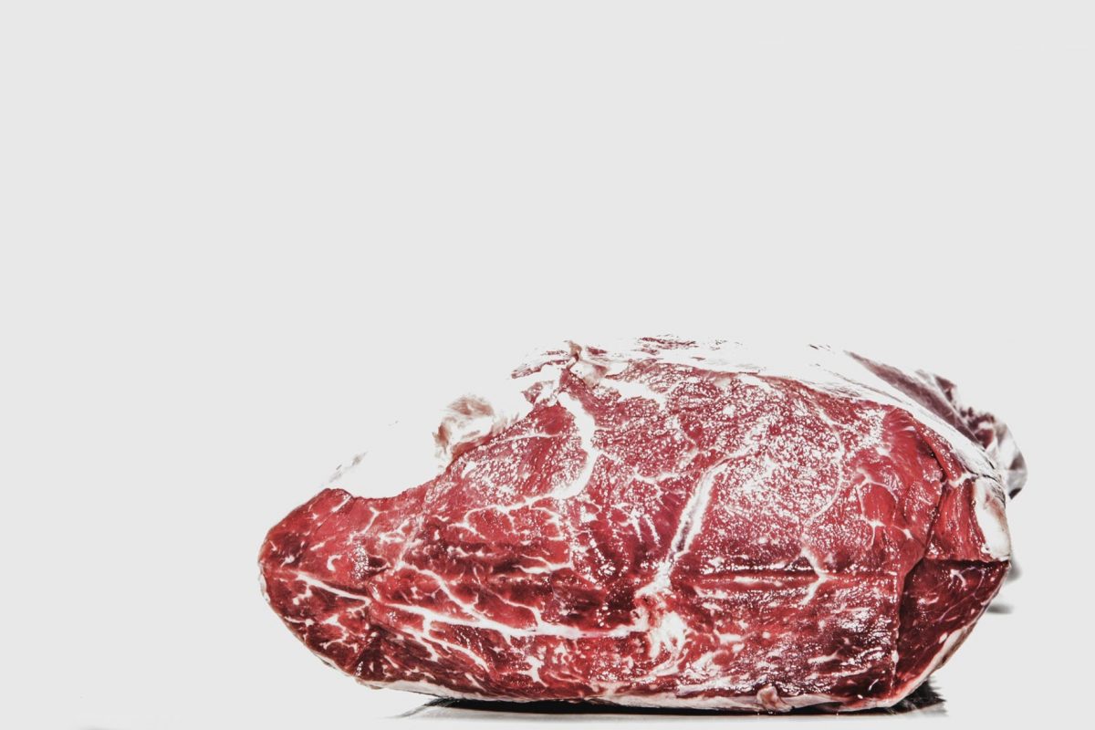 Picture of a meat against white background